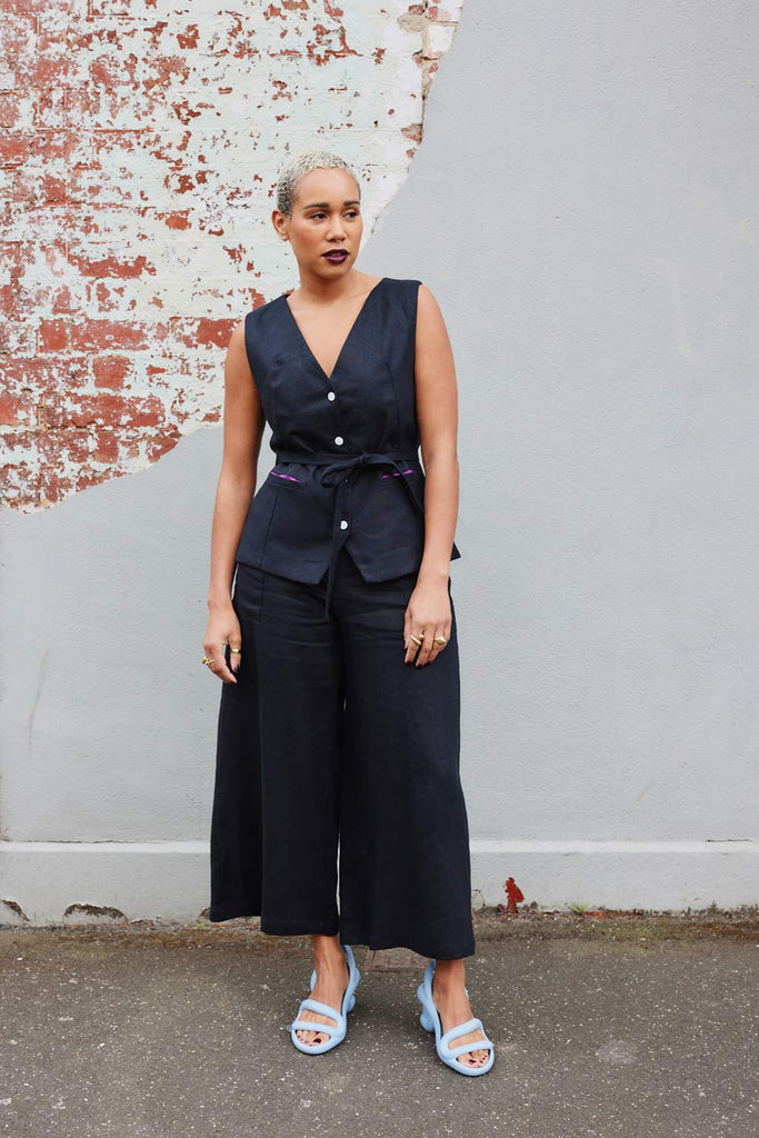 Collective Closets model wearing vest and Culottes pants