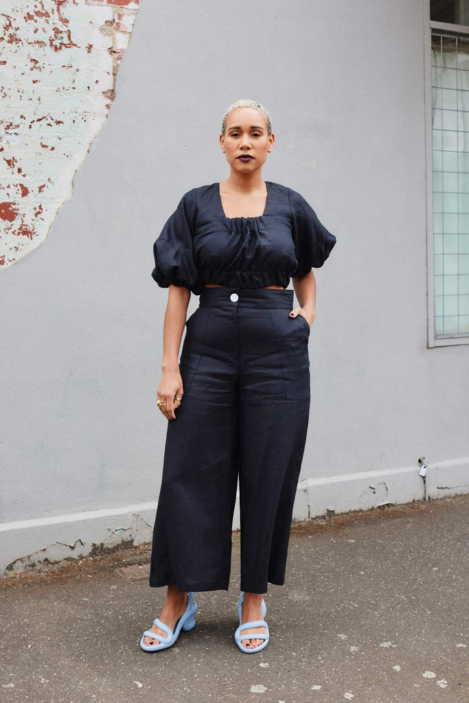 Collective Closets model photo in crop top and culotte pants