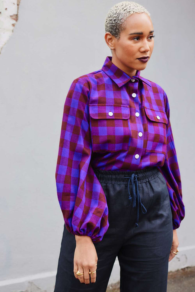 Collective Closets model in purple shirt